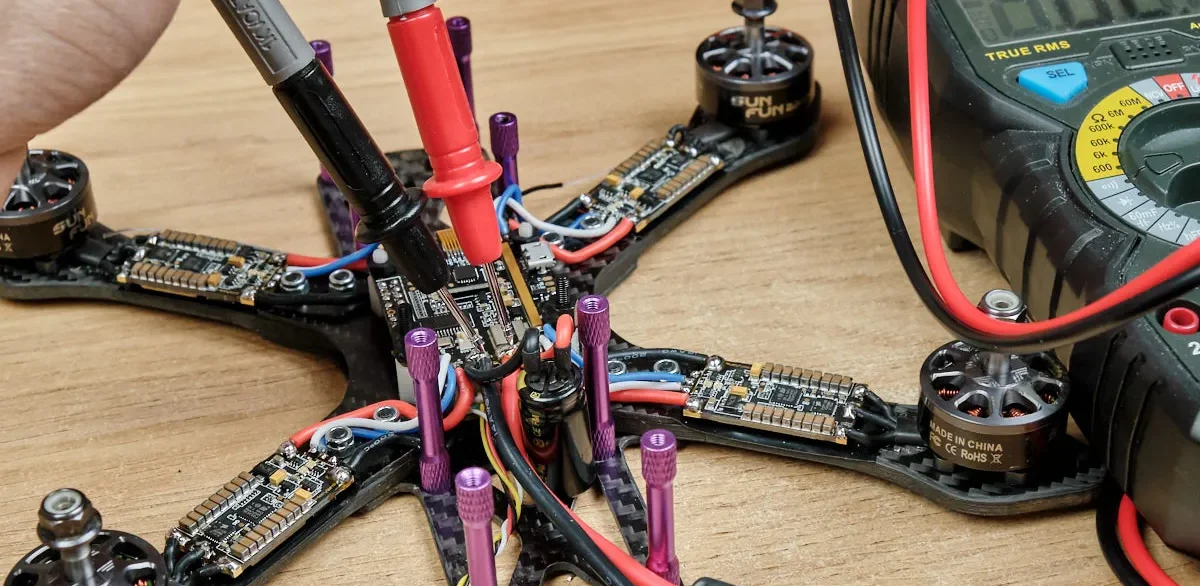 how-to-build-fpv-mini-quad-racing-drone-check-continuity-multimeter