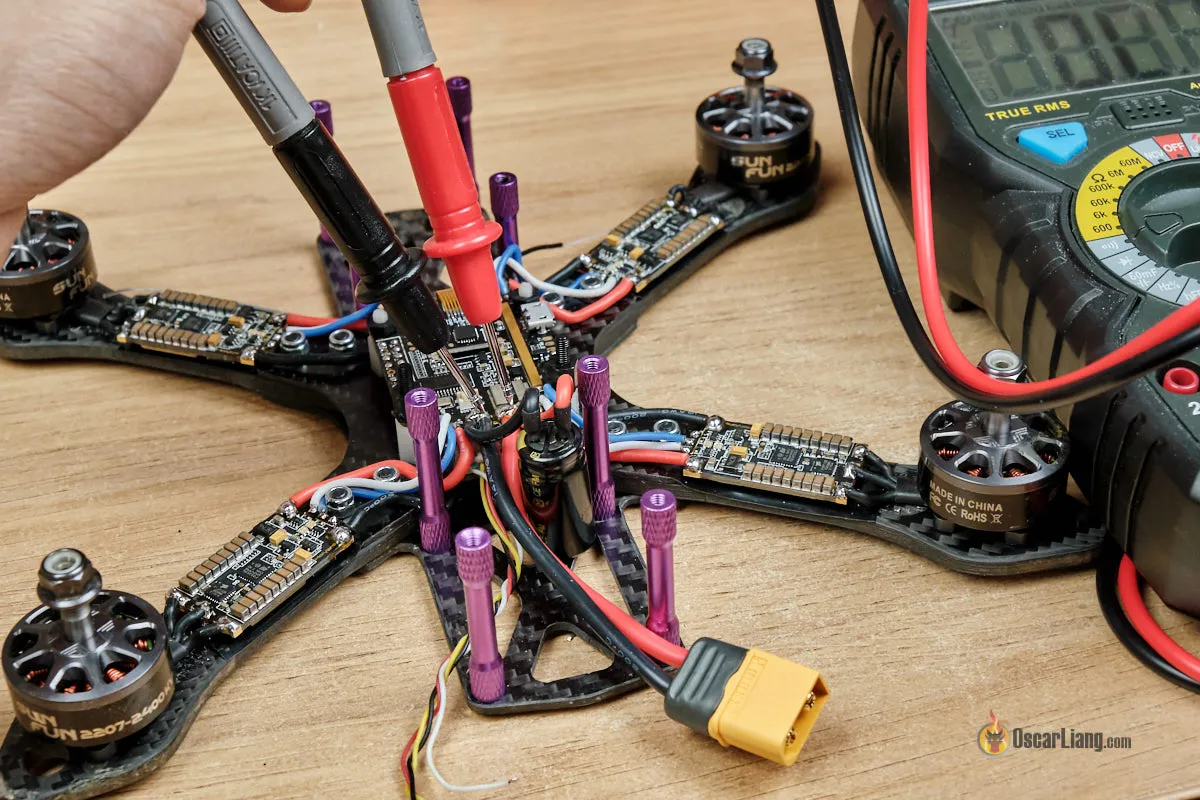 how-to-build-fpv-mini-quad-racing-drone-check-continuity-multimeter